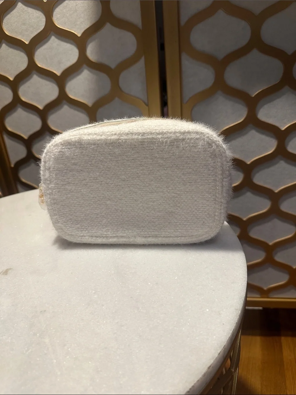 CHANEL cream boucle cosmetic pouch with gold logo